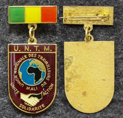Знак UNTM ( Национальный союз трудящихся Мали )