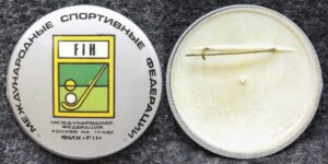 Знак Международная федерация хоккея на траве